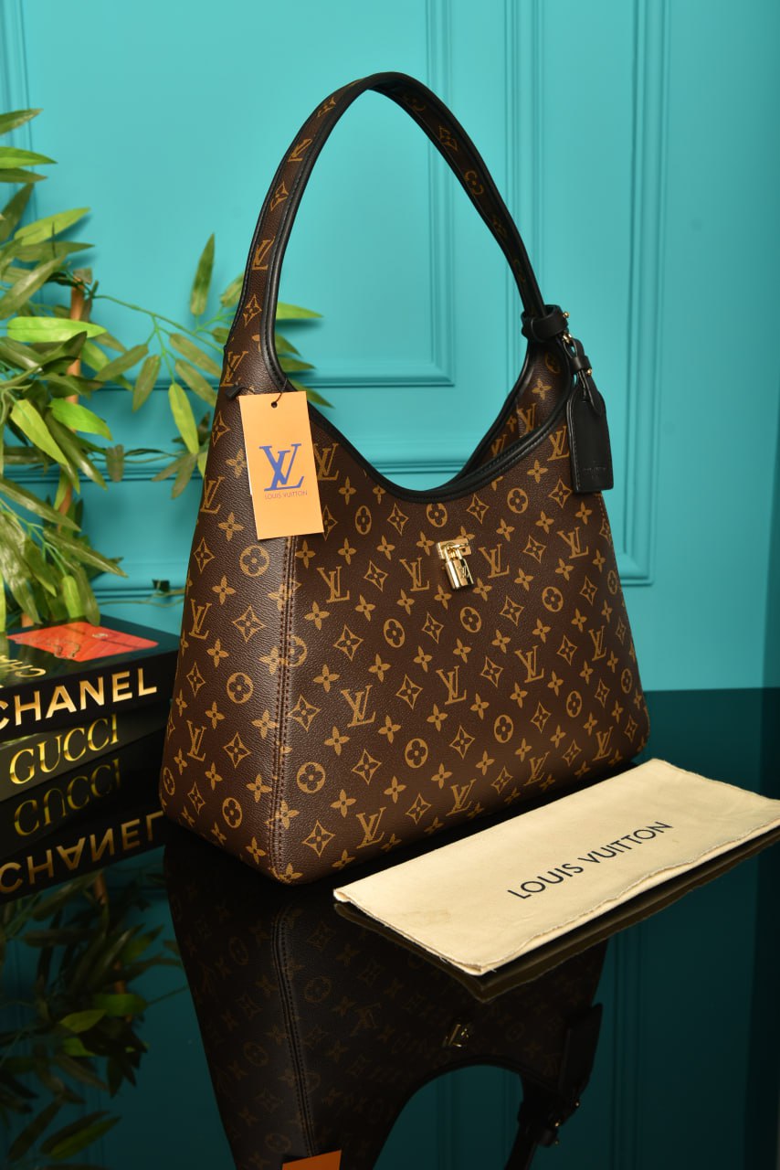 LOUIS VUITTON THE DROP GM