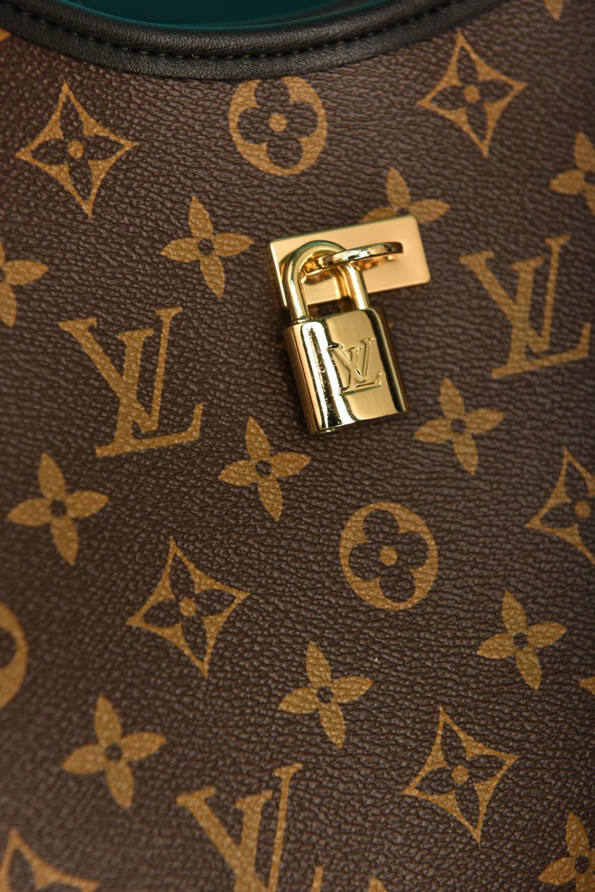 LOUIS VUITTON THE DROP GM