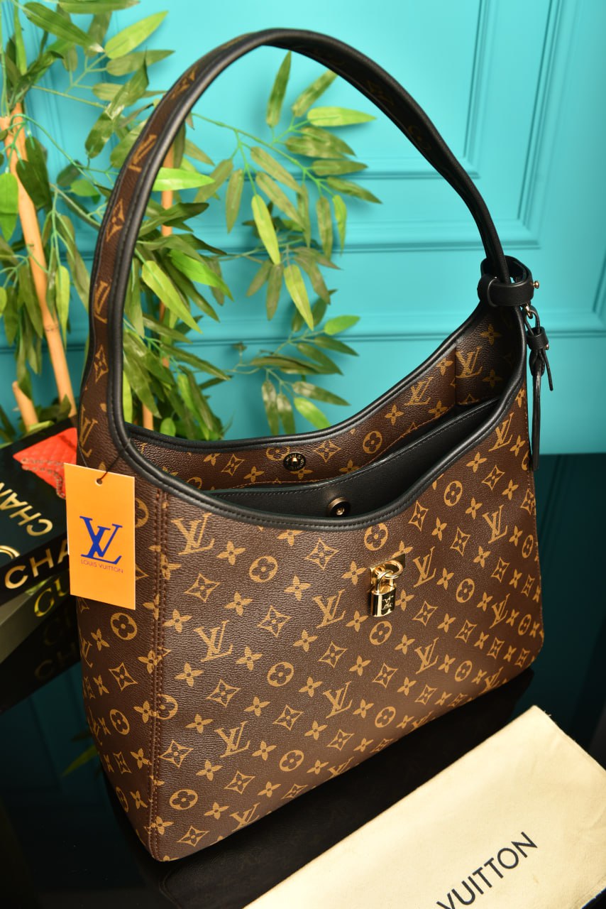 LOUIS VUITTON THE DROP GM