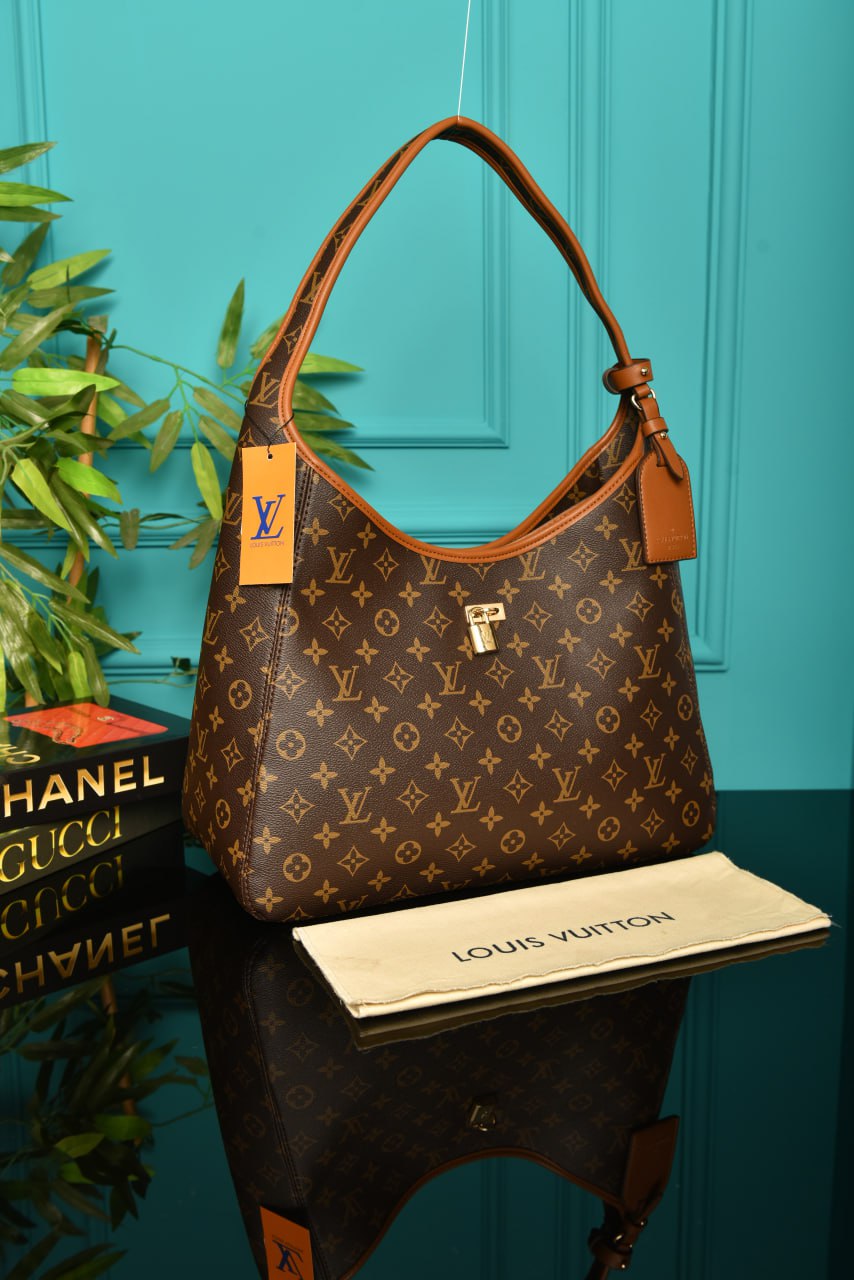 LOUIS VUITTON THE DROP GM