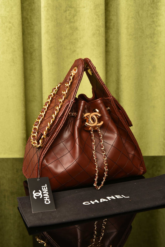CHANEL 25 HANDBAG